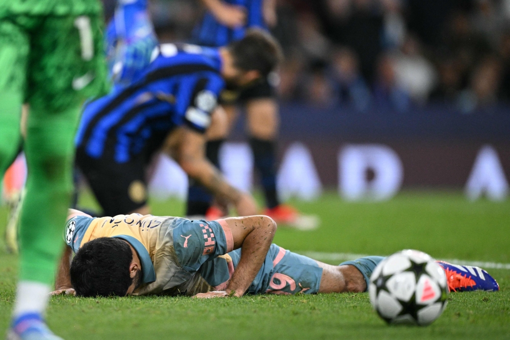 Manchester City's Ilkay Gundogan reacts to missing a late chance during the Uefa Champions League, league phase football match between Manchester City and Inter Milan at the Etihad stadium, in Manchester, north-west England, on September 18, 2024. — AFP pic
