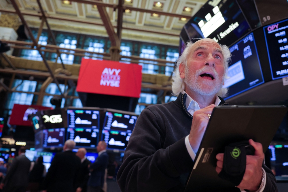 US stocks dip despite surprise larger Fed interest rate cut | Malay Mail