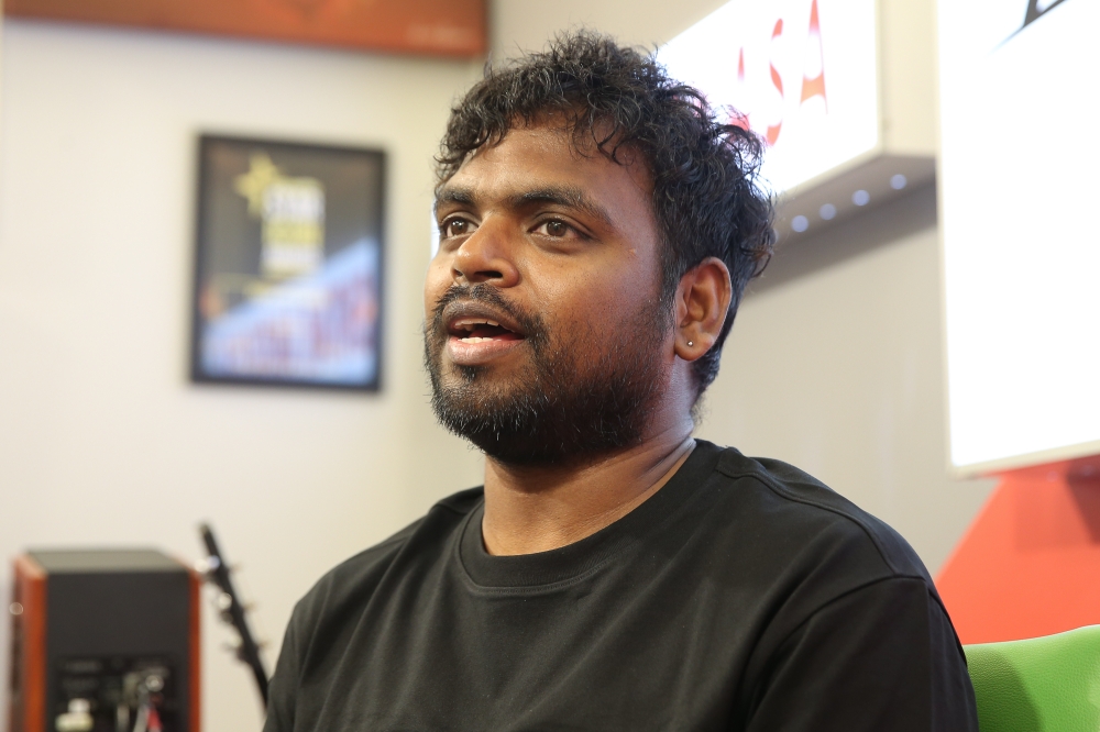 At one point in his life, Santesh took a job as a factory line worker before becoming a lorry driver’s assistant, loading and unloading supplies for wet markets. — Picture By Yusof Mat Isa.