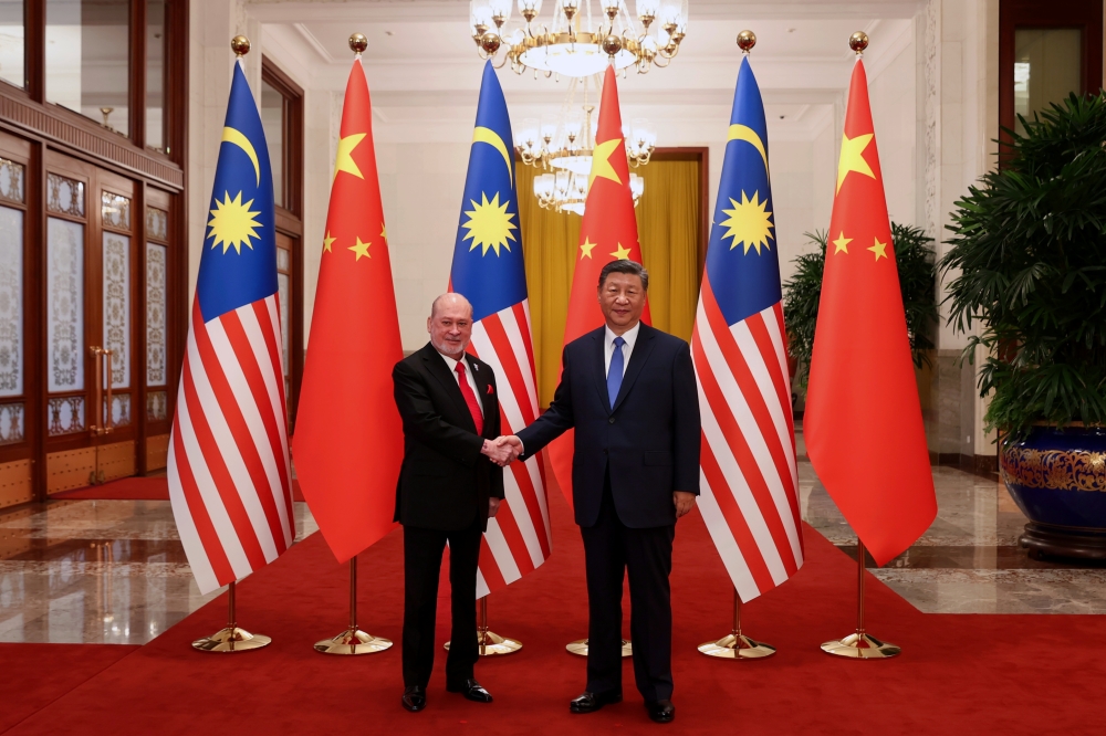 His Majesty Sultan Ibrahim shakes hands with Chinese President Xi Jinping at the Great Hall Of The People in Beijing September 20, 2024. — Bernama pic