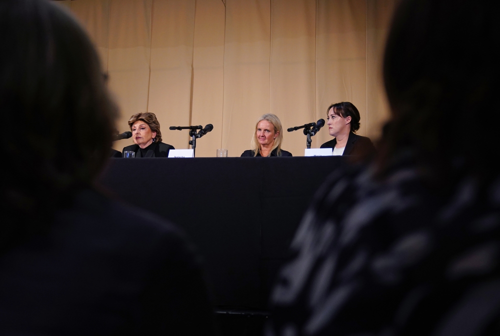 Mohamed Al Fayed's accusers sit in the front row as they listen to the legal team (left to right) American attorney Gloria Allred, Natacha (no surname given) and barrister Maria Mulla, who featured in 'Al-Fayed: Predator at Harrods' during a press conference to discuss their involvement in the investigation and the legal claim against Harrods for failing to provide a safe system of work for their employees, at Kent House in Knightsbridge, London on September 20, 2024. — PA via Reuters pic