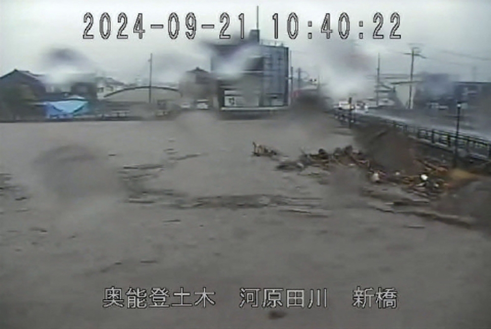 This handout image taken from a CCTV camera from the Ishikawa Prefectural River Information System and received via Jiji Press on September 21, 2024 shows the Kawarada River near its crest due to heavy rains in the city of Wajima, Ishikawa Prefecture. — Ishikawa Prefectural River Information System pic via Reuters
