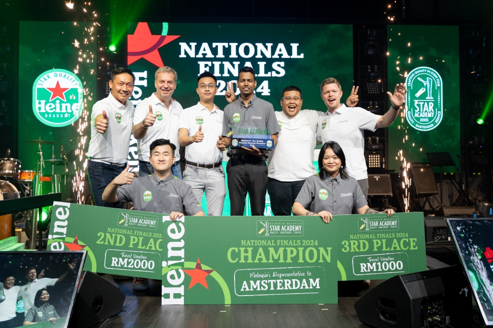 One for the album: (top, from left) Ding, van Keulen, Heineken Malaysia trade marketing head Dcruz, Wong and (bottom, from left) Hulm Lim Tee Hong from La Primuer, representing Johor region and Wendy Hamsy Anak Jack Suji, from Culture City, representing Sarawak region. – Picture by Heineken Malaysia