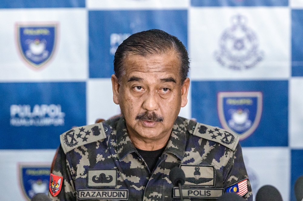 A file photograph shows Inspector-General of Police Tan Sri Razarudin Husain during a press conference on Op Global in Kuala Lumpur on September 17, 2024. — Picture Firdaus Latif