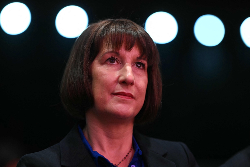 Britain's Chancellor of the Exchequer Rachel Reeves under the lights on stage on the first full day of the annual Labour Party conference in Liverpool September 22, 2024. — AFP pic