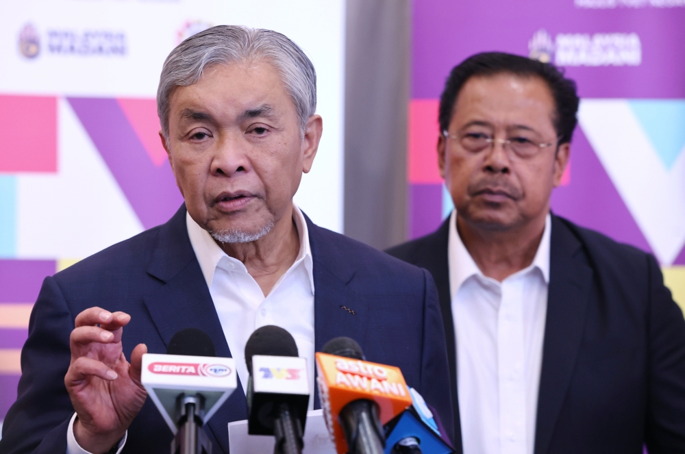 Deputy Prime Minister and Minister of Rural and Regional Development, Datuk Seri Ahmad Zahid Hamidi (left), during a press conference at an engagement session between 66 government-linked companies (GLCs) and private companies with 12 ministries related to technical and vocational education and training (TVET). September 23, 2024. — Bernama pic