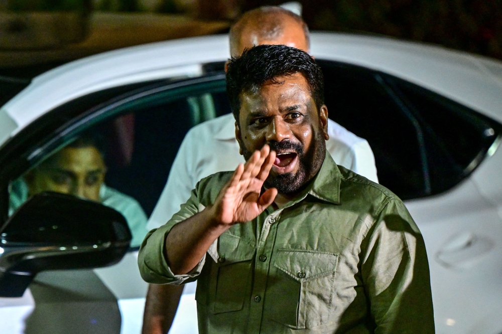 National People's Power (NPP) party's presidential candidate Anura Kumara Dissanayaka, arrives at the Election Commission office in Colombo September 22, 2024, after his victory at Sri Lanka's presidential election. — AFP pic
