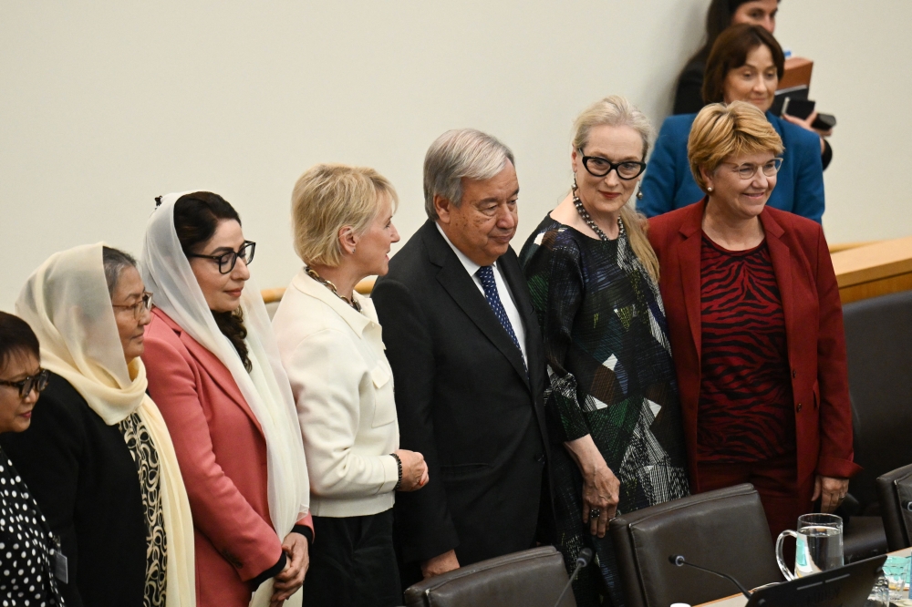 US actress Meryl Streep stands alongside UN Secretary-General Antonio Guterres (centre) as they attend an event on 'The Inclusion of Women in the Future of Afghanistan' on the sidelines of the United Nations General Assembly at UN Headquarters in New York City on September 23, 2024. — AFP pic