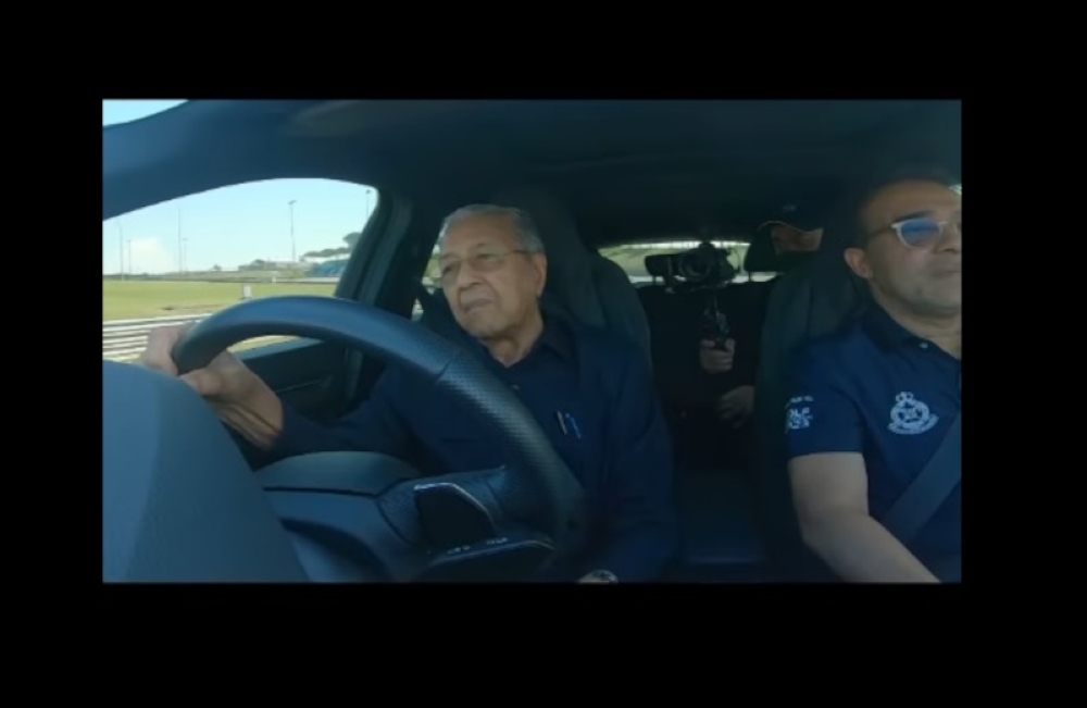 In a video posted on his Facebook page, the 99-year-old is seen hitting speeds of 154km/h behind the wheel at the Sepang International Circuit (SIC). — Screengrab from Facebook/Dr Mahathir bin Mohamad 
