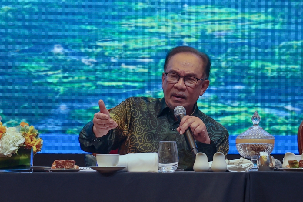 Prime Minister Anwar Ibrahim at the Ilmuan Malaysia Madani Forum yesterday organised by Tenaga Nasional Bhd. — Bernama pic