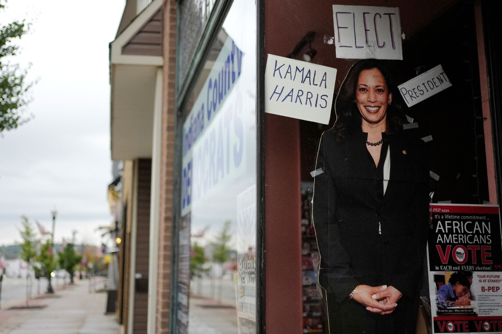A cardboard cut-out of Democratic presidential nominee U.S. Vice President Kamala Harris stands in the window of the offices of the Indiana County Democrats ahead of a campaign rally with Republican presidential nominee former U.S. President Donald Trump in Indiana, Pennsylvania, U.S., September 23, 2024.  — Reuters pic