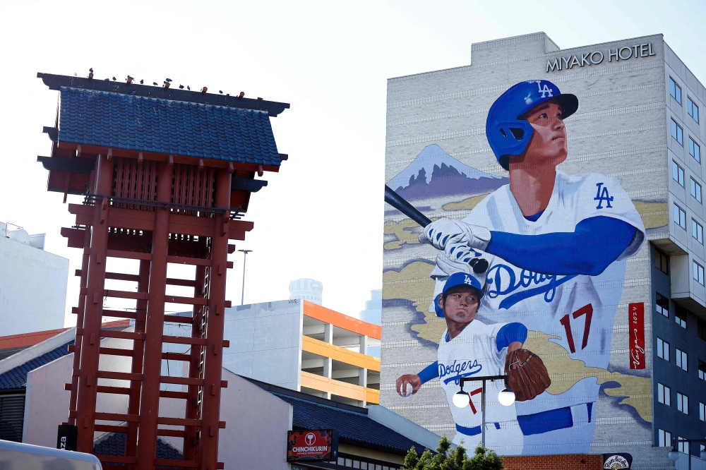 A mural of Shohei Ohtani painted by Robert Vargas is seen on the side of the Miyako Hotel on September 25, 2024 in Little Tokyo, Los Angeles, California. — AFP pic