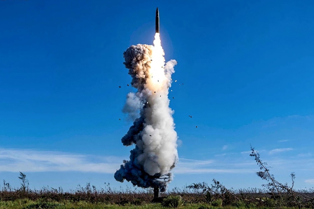 This handout photograph taken on September 25, 2024 and released by the Chinese People's Liberation Army News and Communication Center on September 26, 2024, shows the Chinese People's Liberation Army Rocket Force launching an intercontinental ballistic missile carrying a dummy warhead into the Pacific Ocean, at an undisclosed location. — AFP pic