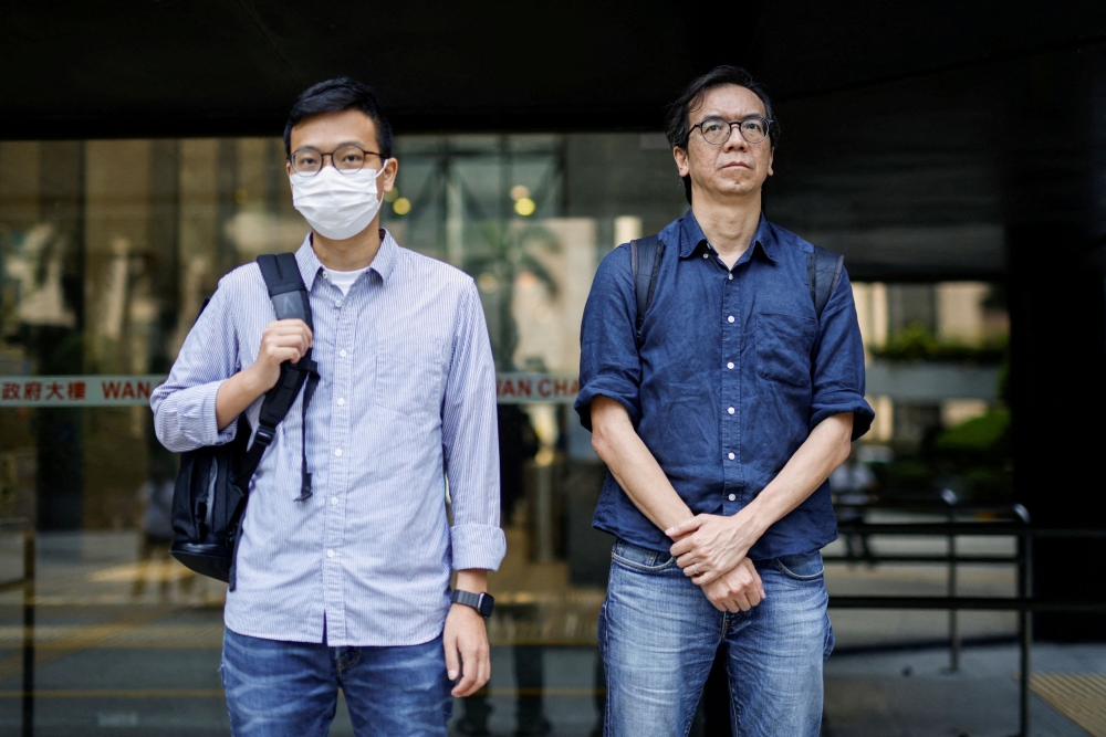 A file photo shows Chung Pui-kuen, former chief editor of the now-shuttered Stand News, and Patrick Lam, former acting chief editor, at the District Court in Hong Kong, China, on June 27, 2023. — Reuters pic