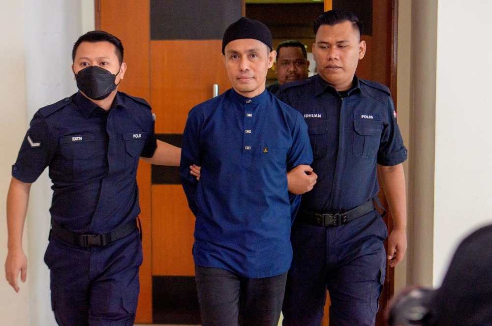 The court sentenced celebrity preacher Azman Syah Alias or better known as PU Azman to 12 years in prison with one stroke of the rotan for the first and second charges, and ordered the sentences to run separately from today. — Bernama pic 