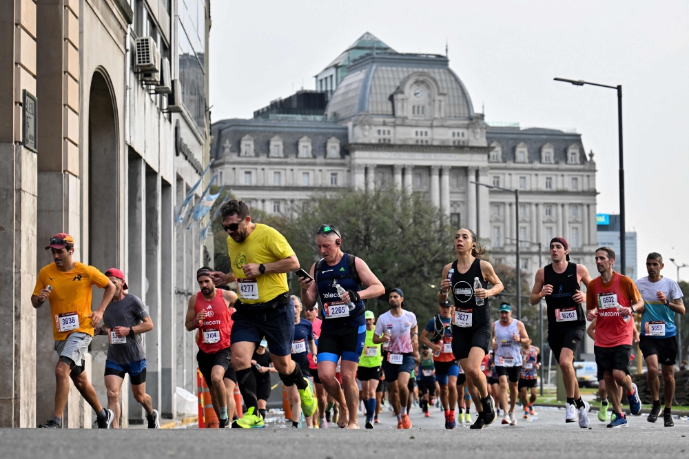 Runners at the Buenos Aires International Marathon on September 22, 2024. — AFP pic