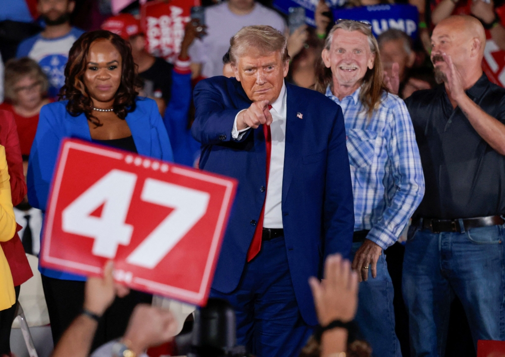Republican presidential nominee and former US President Donald Trump attends a campaign town hall event at Macomb Community College in Warren, Michigan September 27, 2024. — Reuters pic  