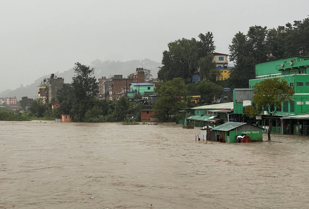 A general view of the overflowing Bagmati River following heavy rains, in Kathmandu, Nepal September 27, 2023. — Reuters pic
