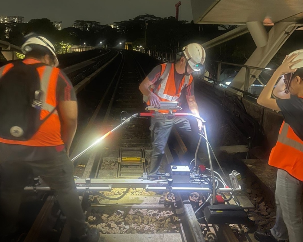 SMRT and the Land Transport Authority (LTA) announced today that 12 new cracks have been discovered along the rail connecting the Jurong East and Buona Vista MRT stations on the East-West Line in Singapore. — Picture via Facebook/SMRT