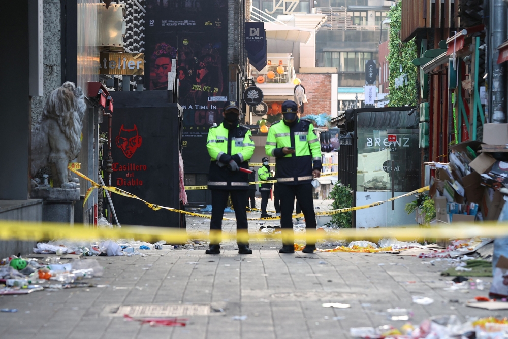 File picture of policemen standing guard at the scene where a stampede during Halloween festivities killed and injured many people at the popular Itaewon district in Seoul, South Korea, October 30, 2022. — Yonhap pic via Reuters