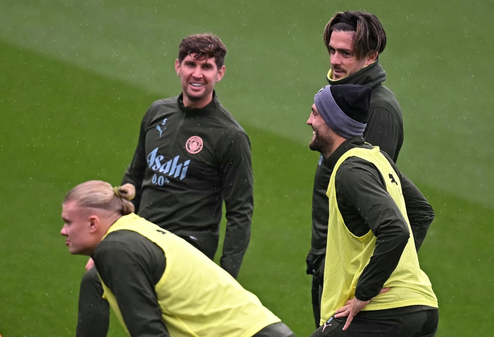 Manchester City's Erling Haaland, John Stones, Mateo Kovacic and Jack Grealish attend a team training session on the eve of their Uefa Champions League 1st round day 2 football match against Slovan Bratislava. — AFP pic