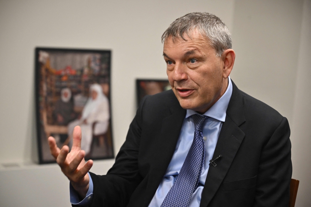 UNRWA chief Philippe Lazzarini highlighted the heavy toll his agency had paid as it serves as the 'backbone' of the vast humanitarian operation underway in war-ravaged Gaza. — AFP pic