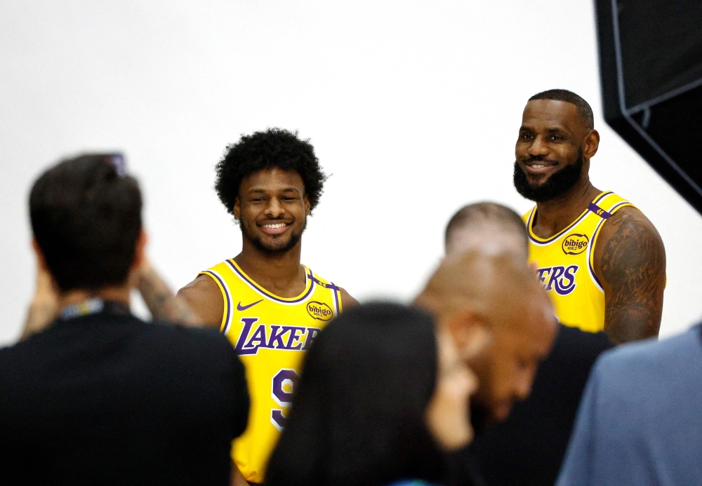 LeBron James said yesterday the historic prospect of playing alongside eldest son Bronny for the Los Angeles Lakers has given him a new lease of life ahead of the upcoming NBA season. — AFP pic