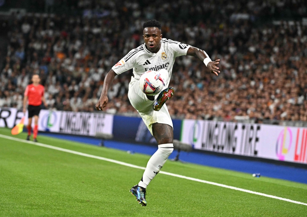 Real Madrid forward Vinicius Junior is hoping to end October with a first Ballon d’Or in his hands in Paris, but his month also begins in France with a Champions League visit to Lille tomorrow. — AFP pic