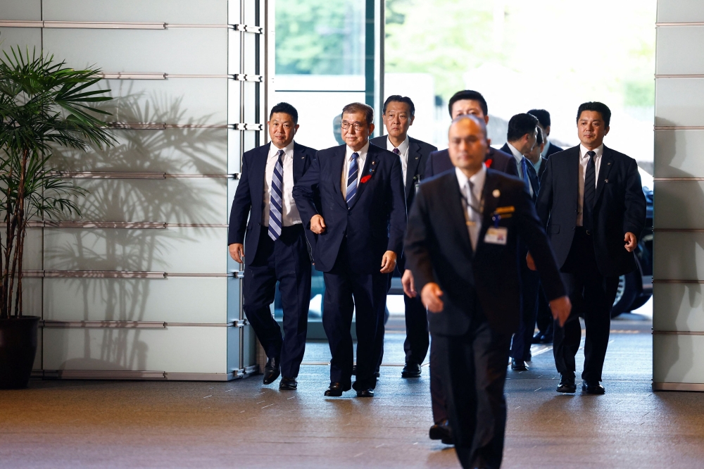 Japan's Prime Minister Shigeru Ishiba arrives at his official residence in Tokyo, Japan October 1, 2024. — Reuters pic