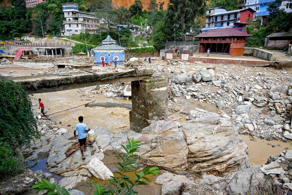 Heavy rains triggered landslides in Lalitpur, a district on the outskirts of Kathmandu, Nepal on October 1, 2024. — Bernama pic
