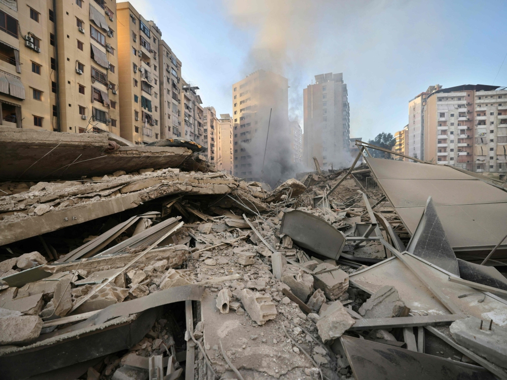 Dust and smoke billow from the site of an overnight Israeli airstrike in Beirut’s southern suburb of Shayyah on October 2, 2024. At least five Israeli strikes hit Beirut’s southern suburbs early October 2, a Lebanese security source said, as the Israeli military said it was targeting Hezbollah sites and issued several evacuation orders. — AFP pic 