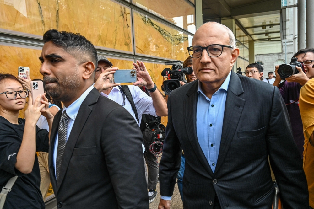 Singapore’s former transport minister and minister-in-charge for trade relations S. Iswaran arrives for sentencing at the Supreme Court Singapore on October 3, 2024. — Reuters pic