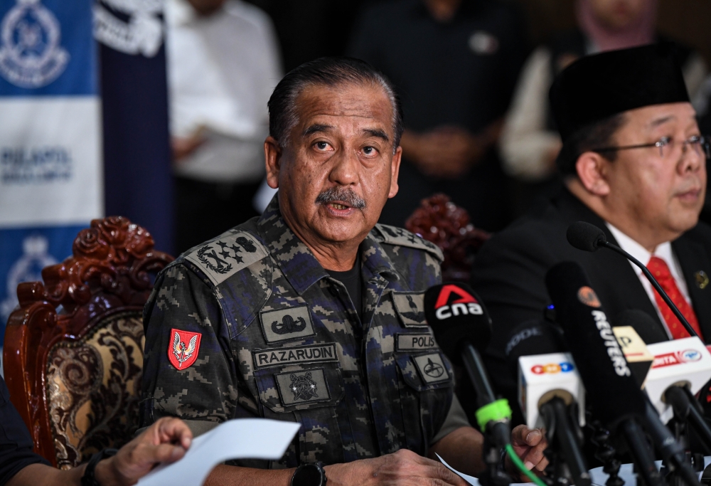 Inspector-General of Police Tan Sri Razarudin Husain said the freeze involved 205 bank accounts worth RM1.35 million and one account holding US$1,344.26 (RM5,688.80). — Bernama pic