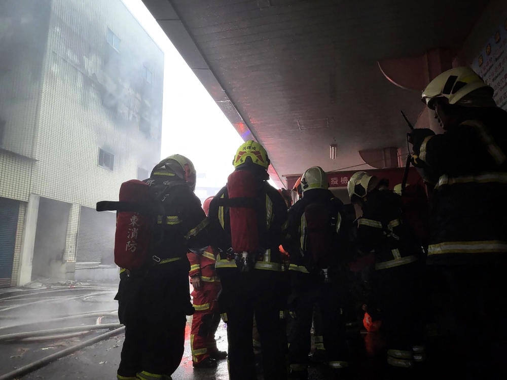 Firefighters respond to a fire at Donggang Antai Hospital in Pingtung County on October 3, 2024. — AFP pic