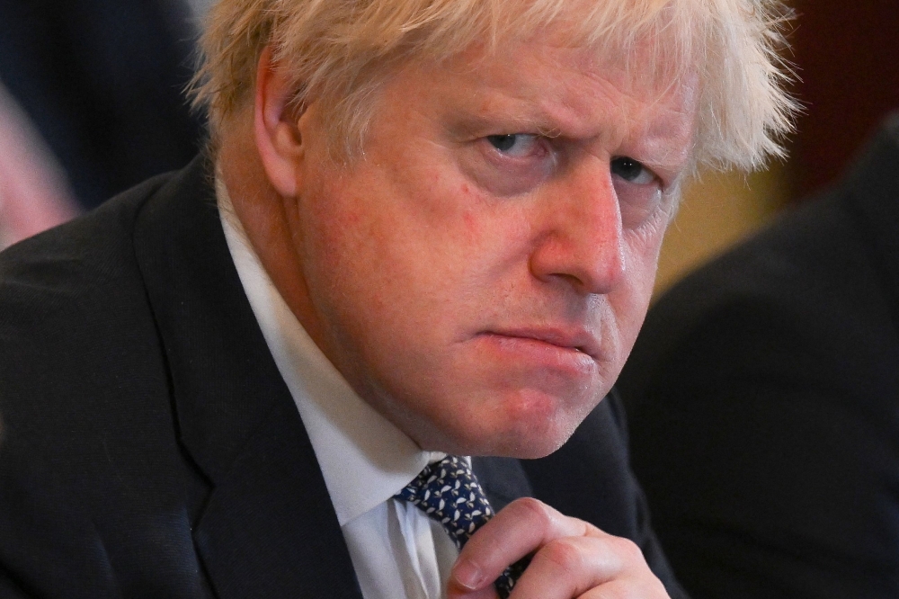 A file photograph shows Boris Johnson at 10 Downing Street in London on May 24, 2022. — AFP pic