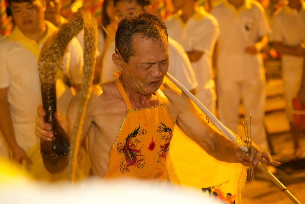 A Taoist devotee performs a ritual during the Nine Emperor Gods Festival at the Tow Boo Kong Temple in Butterworth, Penang on October 3, 2024. — Picture from Facebook/Tow Boo Kong Temple