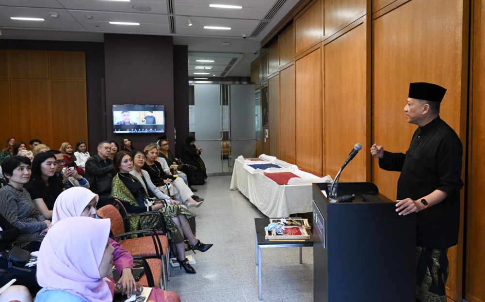 Ambassador Datuk Seri Nazri Aziz (far right) gives a talk on Malaysia’s songket to an audience of some 200 visitors at the George Washington University Museum and The Textile Museum to its first ever curated exhibition on the songket on October 3, 2024. — Picture courtesy of the Malaysian Embassy in the US