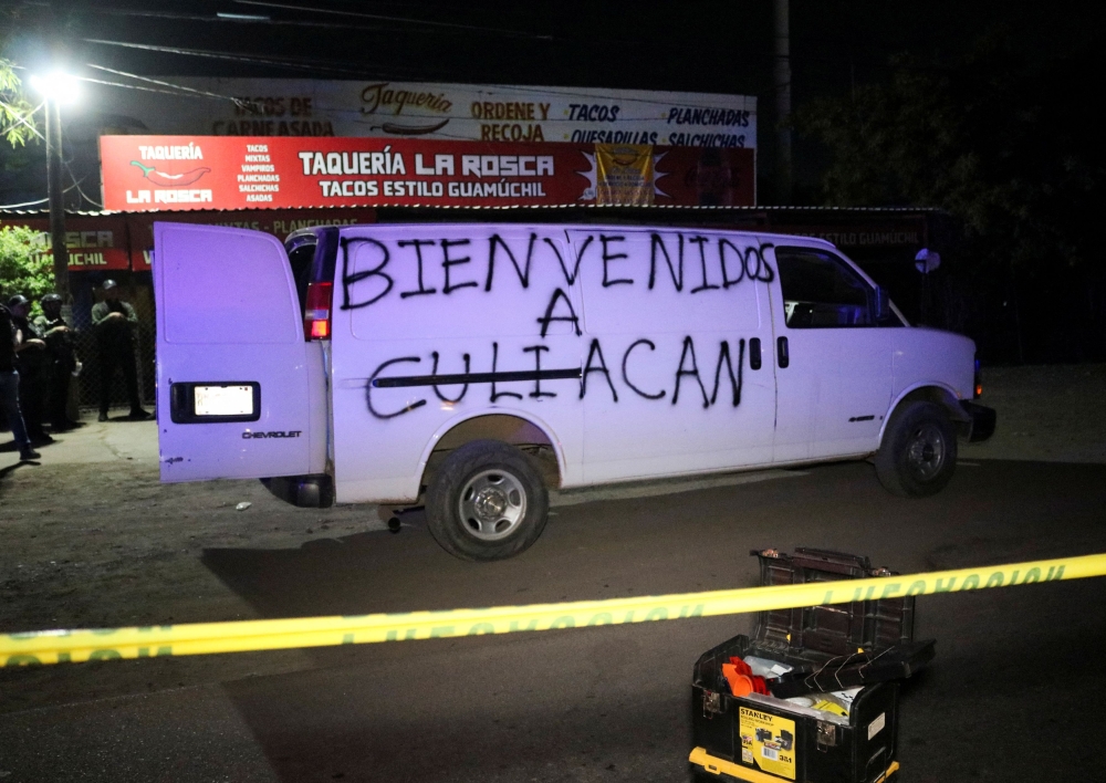 A view of an abandoned van with graffiti reading ‘Welcome to Culiacan’, in which six bodies were found in the western state of Sinaloa, in Culiacan September 27, 2024. — Reuters pic  