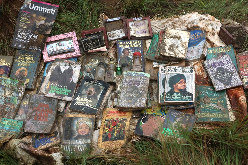 A file photograph shows religious books and pamphlets seized from a premises linked to GISB Holdings in Kota Baru, on September 21, 2024. — Bernama pic