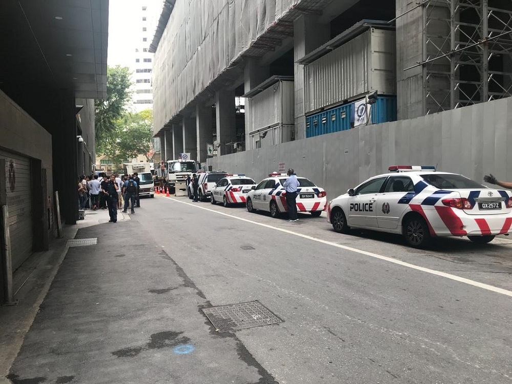 A file photograph shows Singaporean police officers in the Central Business District in Singapore on March 6, 2019. — TODAY pic