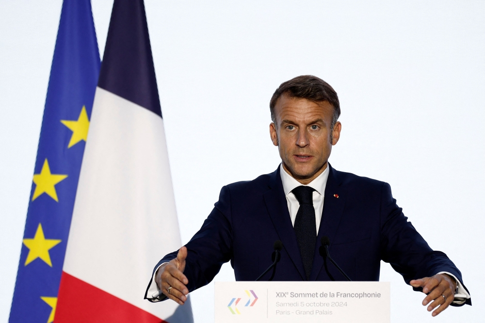 French President Emmanuel Macron gestures as he speaks during a press conference at the 19th Francophonie Summit at the Grand Palais in Paris, France, October 5, 2024. — Reuters pic