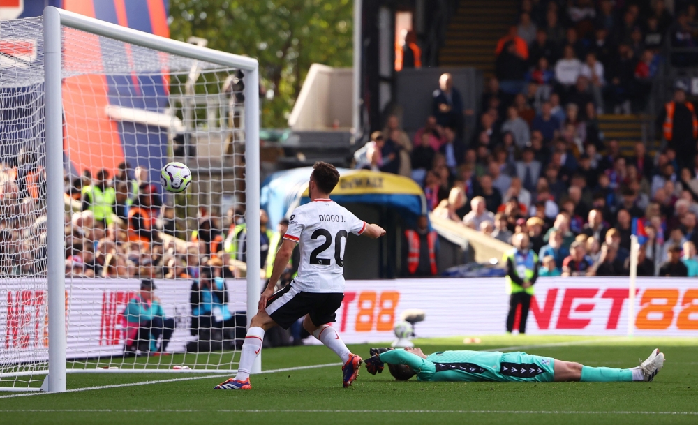 Liverpool's Diogo Jota scores against Crystal Palace in their Premier League match at Selhurst Park, London, on October 5, 2024. — Reuters pic