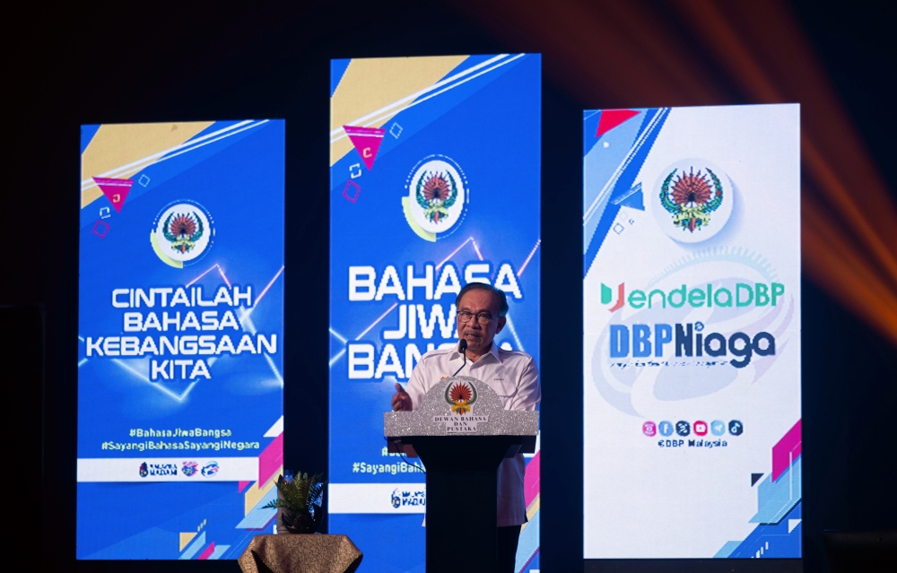 Prime Minister Datuk Seri Anwar Ibrahim speaks at the launch of National Language Month 2024 at Ipoh Convention Centre, Oct 6, 2024. — Bernama pic
