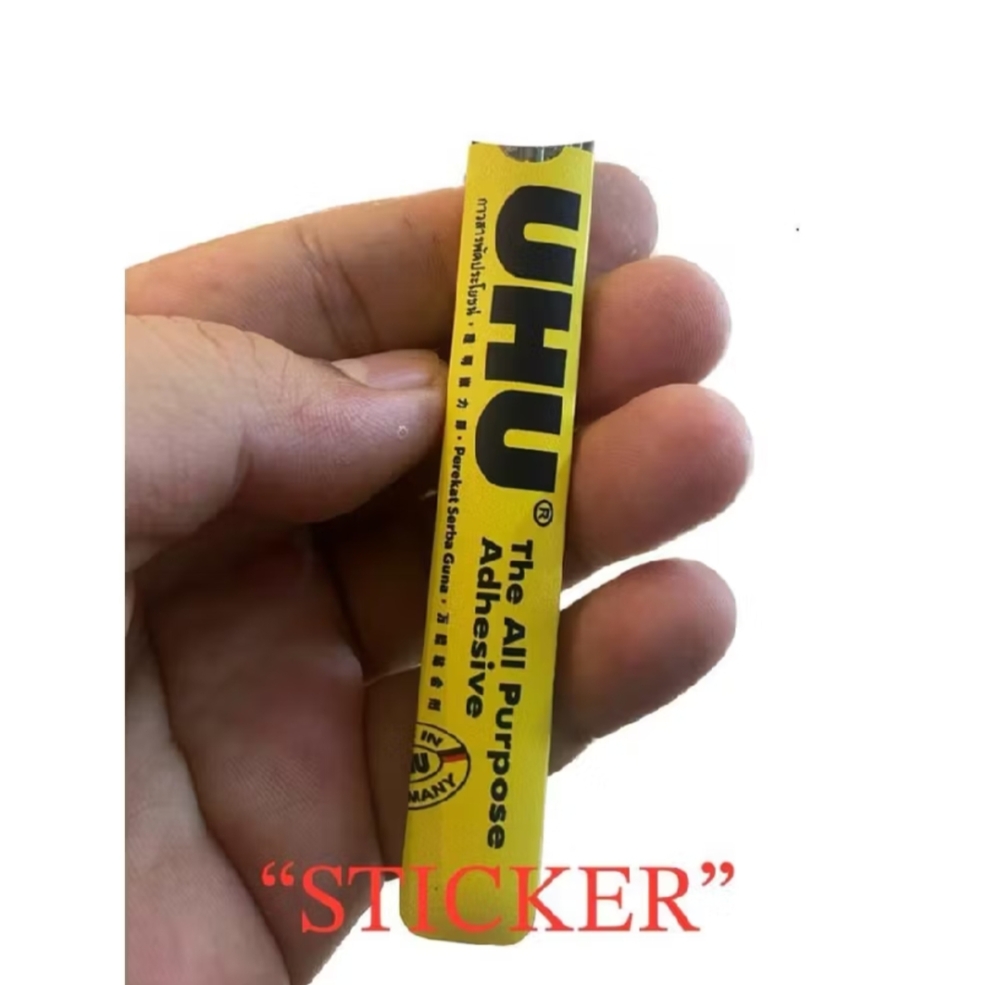 Not your usual glue stick: A vape device wearing a UHU glue skin. — Picture from Shopee