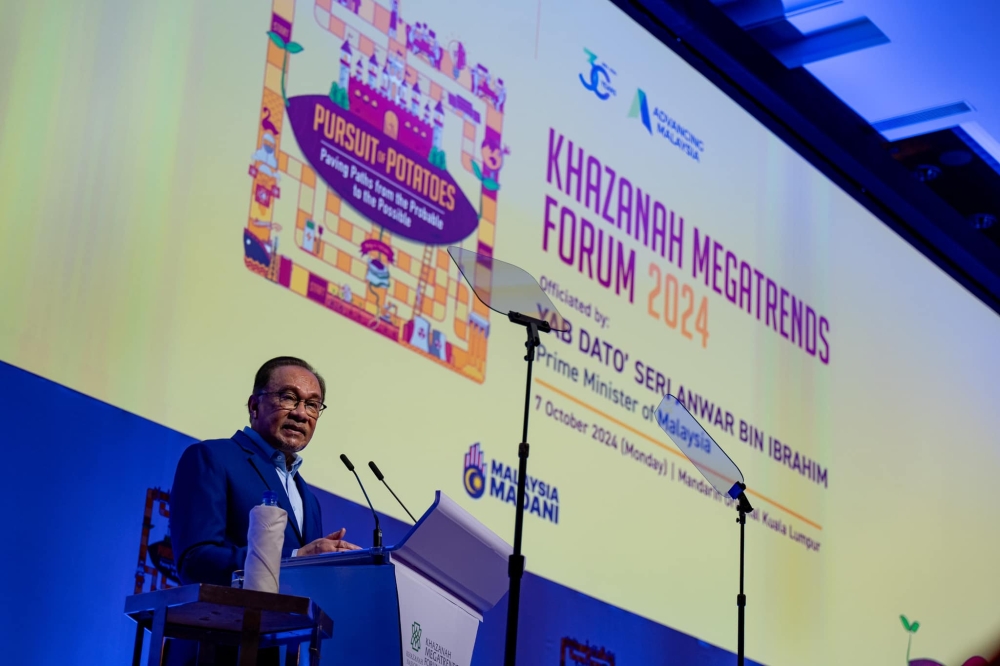Prime Minister Datuk Seri Anwar Ibrahim said the way forward must be a development pathway that is forward-looking, and solutions-oriented, always serving the well-being of the rakyat by addressing inequality, while also cultivating a mindset of shared responsibility and innovation. — Picture via Facebook/Anwar Ibrahim