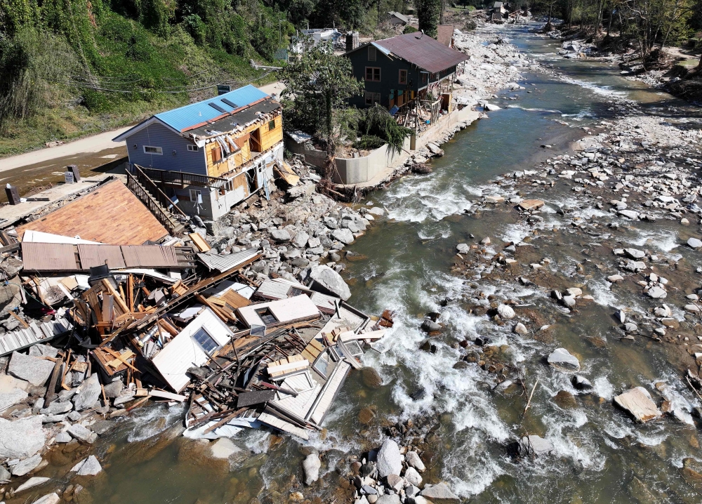 An aerial view of destroyed and damaged buildings in the aftermath of Hurricane Helene flooding on October 8, 2024 in Bat Cave, North Carolina. — Getty Images via AFP pic