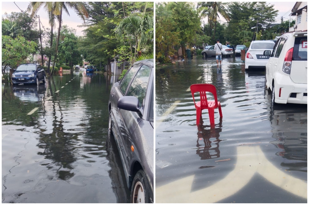 Several parts of Klang was hit by flood after a heavy downpour this afternoon. — Picture by Joe Lee