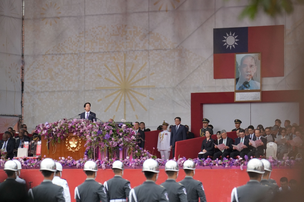 Taiwan’s President Lai Ching-te delivers his address from the podium during National Day celebrations in front of the Presidential Office in Taipei on October 10, 2024. — AFP pic