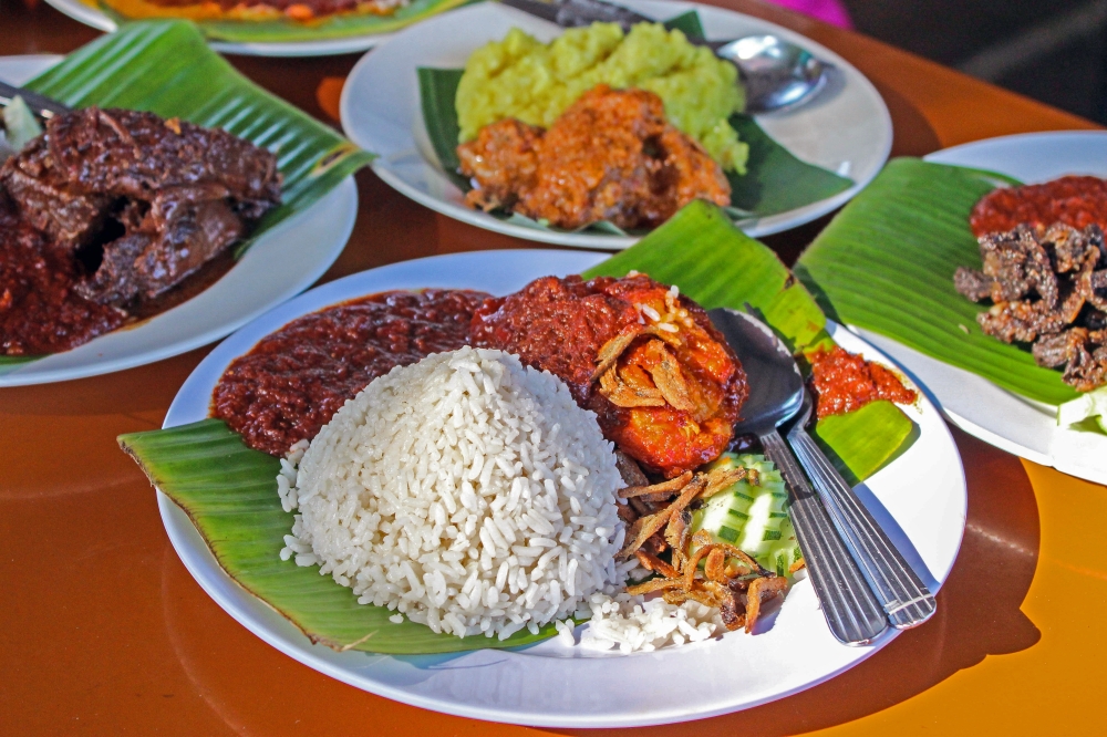 From Penang’s Char Kway Teow and Hokkien Mee to Kuala Lumpur’s many variations of Nasi Lemak, Malaysia offers a rich tapestry of tastes shaped by its diverse culture. — File pic via Bernama