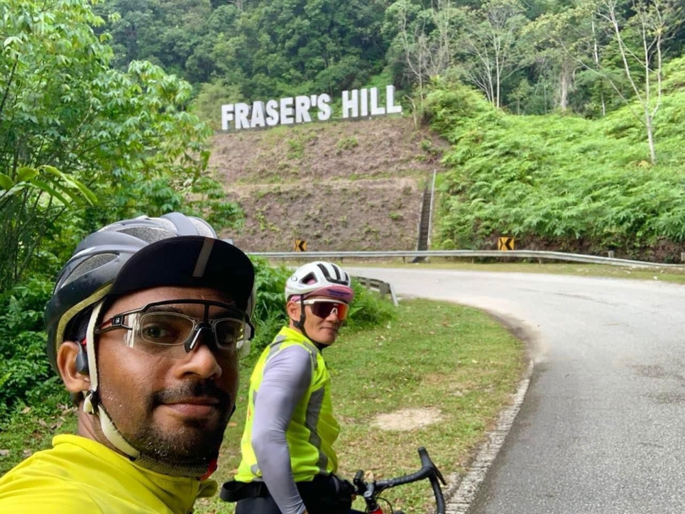 Fazrul (left) and Darsani during one of their rides up Frasers Hill. — Picture courtesy of Fazrul Farouk